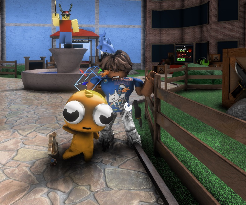 Prism close-up of star's avatar next to an orange character with big eyes